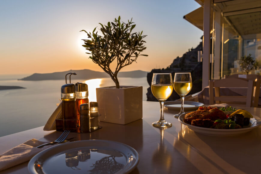 Explore the romantic side of Santorini-Enjoy romantic dinners with a view-KamariTours