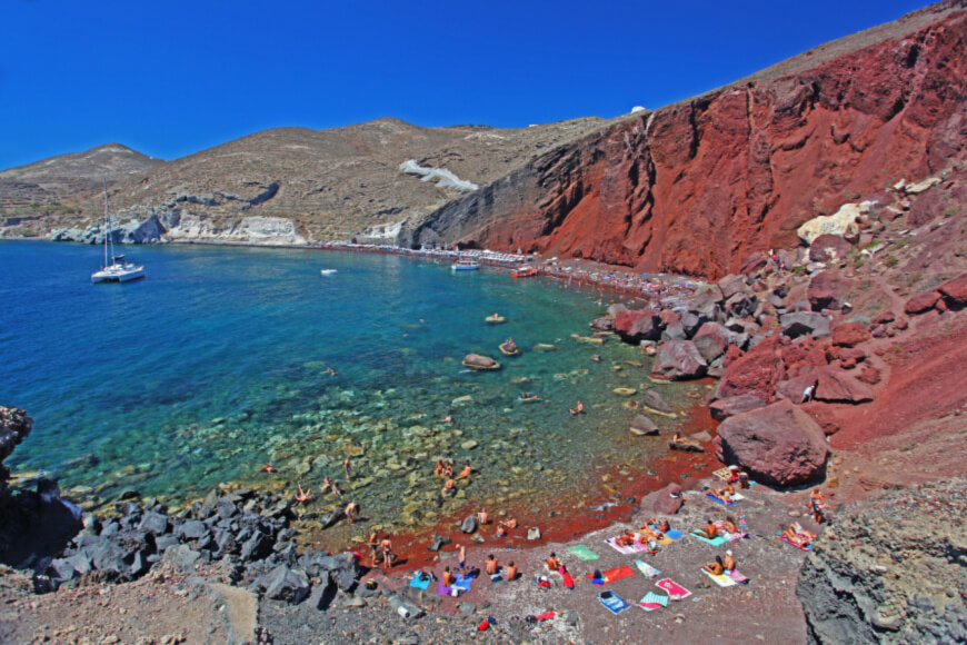Explore the romantic side of Santorini-Visit the alluring Red Beach-KamariTours